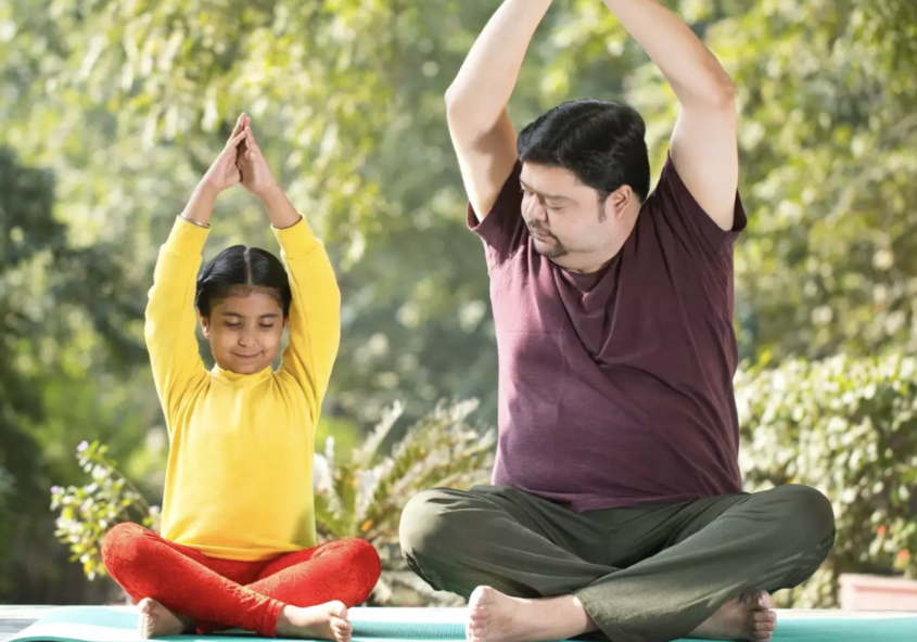 Girl practicing yoga | Yoga & workout for children