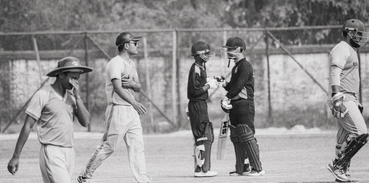 Cricketers playing on a cricket field | sports and fitness for kids in India