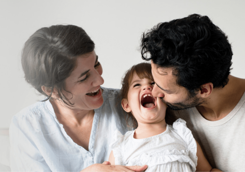 Parents laughing with their daughter | Fitness programs for children in India